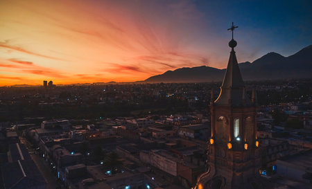Aerial drone view of Arequipa main square and cathedral church, with the Misti volcano at sunset. Arequipa, Peru.の写真素材
