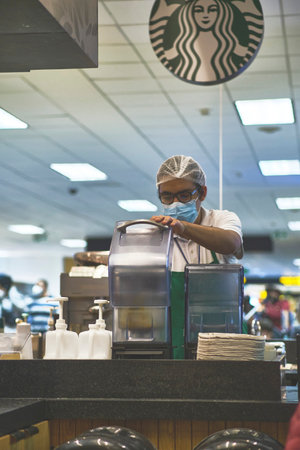 Lima, Peru. Jul, 2022: Starbucks coffee shop at Lima Airport in Peru. Starbucks is the world largest coffee houseのeditorial素材