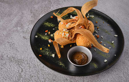 Gourmet corn croquettes, delicious Peruvian corn balls, selective focusの写真素材