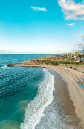 Top view picturesque public beach with turquoise water. Los Corales, La Guaira, Venezuelaの写真素材