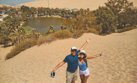 The Huacachina oasis is a natural oasis in the middle of the desert, which is located in the city of Ica, Peru.の写真素材