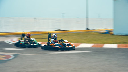LIMA, 2023. Kartodromo Racing Dakart, A driver in gear and helmet drives a racing car. In action. Canete, Asia, Peru.のeditorial素材