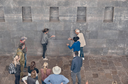CUSCO, PERU. 2023: guided tour for tourists in Incan Temple to the Sun. Santo Domingo Convent on the ruinsのeditorial素材