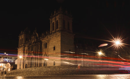 Historic Colonial Buildings on the Plaza de Armas Square with Many Visitors at Night, Cusco, Peru, South Americaの写真素材