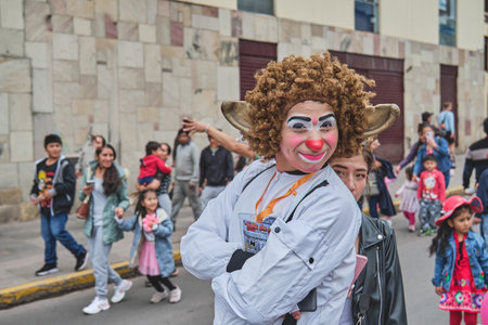 Cusco, Peru, 2023. Clowns meet. Portrait of a smiling person at the Cusco clown parade.のeditorial素材
