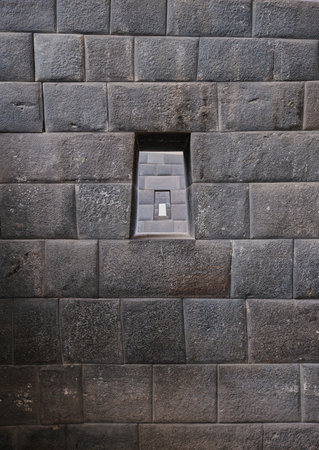 Cusco, Peru. 2023, Three aligned trapezoidal windows in an Inca wall, Coricancha uins, Santo Domingo Convent, Cuszo, Peruのeditorial素材