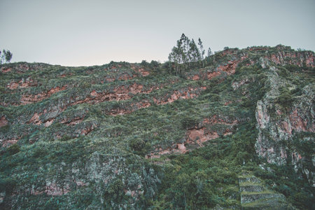 Ancient inca cemetery in the mountains Pisac Archaeological Complex in Sacred Valley of Peru.の写真素材