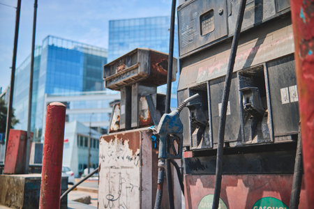 Oil crisis, new era of green technology, gas station obsolete by electric cars