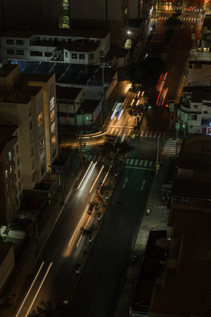 aerial top view Street traffic timelapse of traffic on the road. Blurred cars light trails.