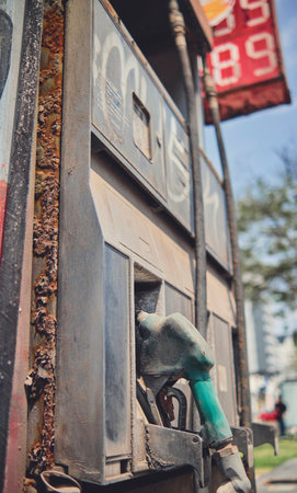 Fossil fuel station, gasoline, obsolete due to new advances in cars with green energy,の写真素材