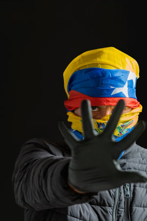 Hand as a symbol of stopping dictatorship, violation of human rights in venezuelaの写真素材