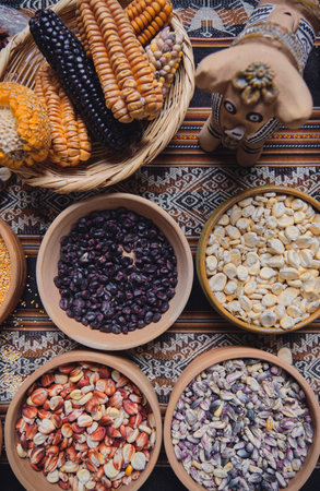 Various dried spices, andean cereals and grains in small bowls and raw herbs, andean peruvian cultureの写真素材