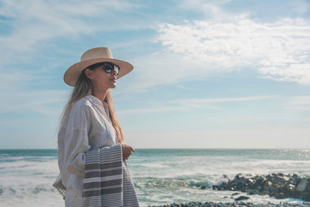 Tourist enjoying summer time by the seaの写真素材