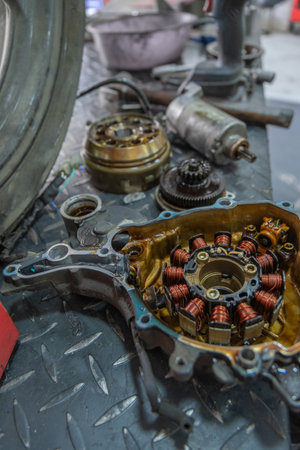 Motorcycle stator repairing in mechanical workshopの写真素材