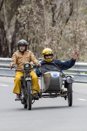 Adelaide, Australia - September 25, 2016: Vintage Motorcycle with sidecar on country roads near the...