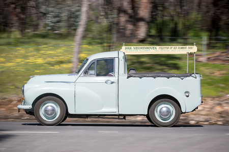 Adelaide, Australia - September 25, 2016: Vintage 1953 Morris Minor Utility driving on country roads near the town of Birdwood, South Australia.のeditorial素材