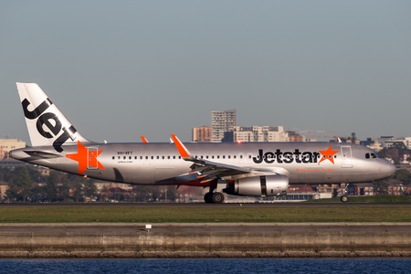 Sydney, Australia - May 5, 2014: Jetstar Airways Airbus A320 airliner landing at Sydney Airport.のeditorial素材