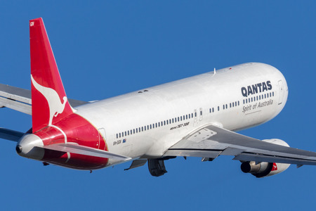 Sydney, Australia - May 5, 2014: Qantas Boeing 767 airliner taking off from Sydney Airport.のeditorial素材
