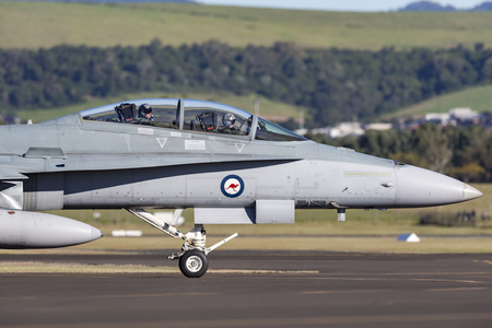 Albion Park, Australia - May 4, 2014: Royal Australian Air Force (RAAF) McDonnell Douglas F/A-18B Hornet jet aircraft A21-110 at Illawarra Regional Airport, Albion Park.のeditorial素材
