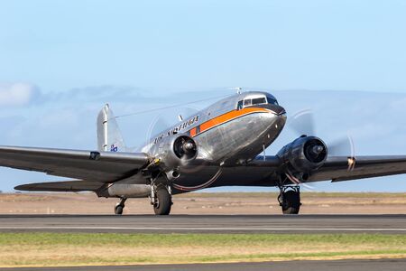Avalon, Australia - March 2, 2013: Vintage Douglas DC-3 airliner VH-TMQ operated by Air Nostalgia...