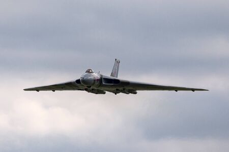 RAF Waddington, Lincolnshire, UK - July 6, 2014: Former Royal Air Force (RAF) Avro Vulcan B.2 bomber aircraft XH558 operated by the Vulcan to the Sky Trust.のeditorial素材