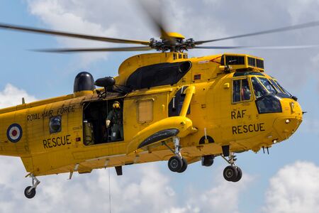 RAF Waddington, Lincolnshire, UK - July 5, 2014: Royal Air Force Westland Sea King HAR3 search and rescue helicopter XZ595 from 202 squadron based at RAF Valley.のeditorial素材