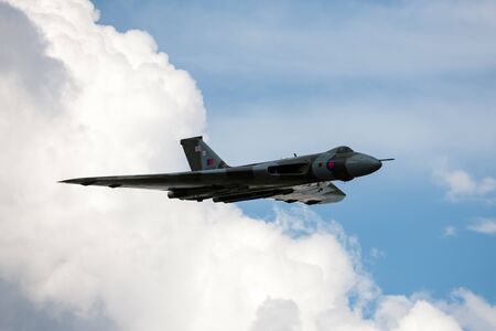 RAF Waddington, Lincolnshire, UK - July 6, 2014: Former Royal Air Force (RAF) Avro Vulcan B.2 bomber aircraft XH558 operated by the Vulcan to the Sky trust at the 2014 RAF Waddington Airshow.のeditorial素材