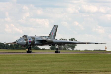 RAF Waddington, Lincolnshire, UK - July 6, 2014: Former Royal Air Force (RAF) Avro Vulcan B.2 bomber aircraft XH558 operated by the Vulcan to the Sky trust at the 2014 RAF Waddington Airshow.のeditorial素材