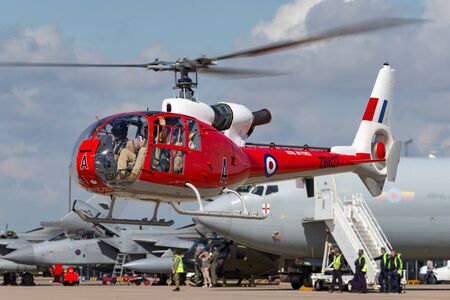 RAF Waddington, Lincolnshire, UK - July 7, 2014: Former Royal Air Force (RAF) Aerospatiale SA-341D Gazelle HT.3 G-CBSK.のeditorial素材