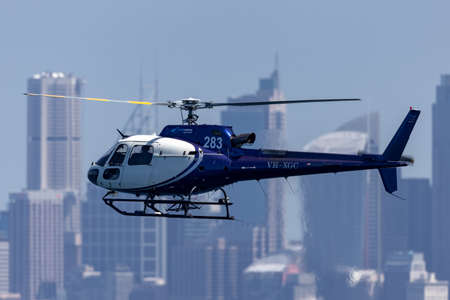Sydney, Australia - October 11, 2013: Eurocopter AS 350B3 Helicopter VH-XGC conducting aerial...