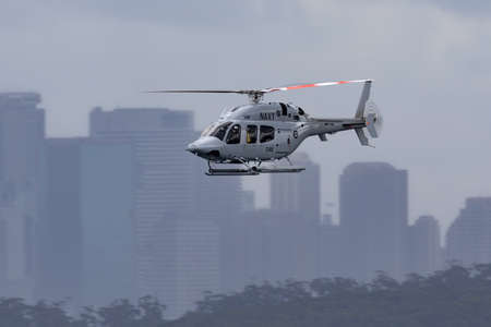 Sydney, Australia - October 3, 2013: Royal Australian Navy (RAN) Bell 429 Helicopter N49-048 flying...