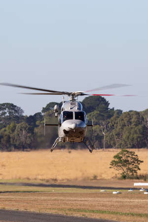 Tyabb, Australia - March 9, 2014: Royal Australian Navy (RAN) Bell 429 Helicopter N49-049 operated by 723 Squadron based at HMAS Albatross in Nowra, NSW.のeditorial素材