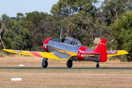 Tyabb, Australia - March 9, 2014: North American AT-6C Harvard VH-NZH single engine military...