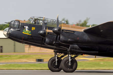 RAF Fairford, Gloucestershire, UK - July 13, 2014: Royal Air Force (RAF) Battle Of Britain Memorial Flight Avro Lancaster bomber PA474 aircraft.のeditorial素材