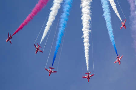 RAF Fairford, Gloucestershire, UK - July 13, 2014: Royal Air Force (RAF) Red Arrows formation...