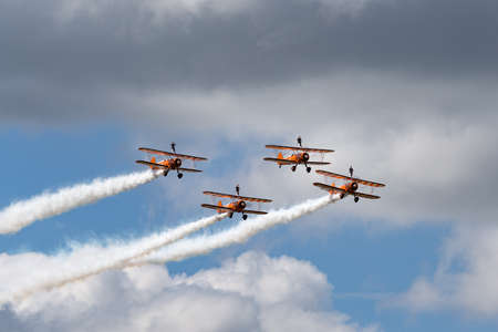 RAF Fairford, Gloucestershire, UK - July 14, 2014: Breitling Wing Walkers Boeing Stearman Biplanes...