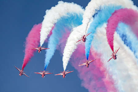 RAF Fairford, Gloucestershire, UK - July 13, 2014: Royal Air Force (RAF) Red Arrows formation...