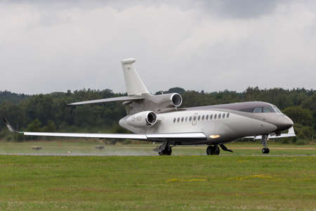 Farnborough, UK - July 19, 2014: Dassault Falcon 7X luxury corporate jet aircraft LX-MES.