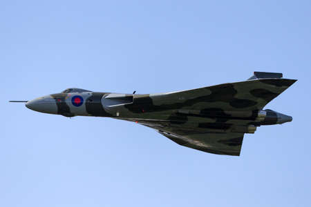 Farnborough, UK - July 19, 2014: Former Royal Air Force (RAF) Avro Vulcan B.2 bomber aircraft XH558 operated by the Vulcan to the Sky Trust.のeditorial素材