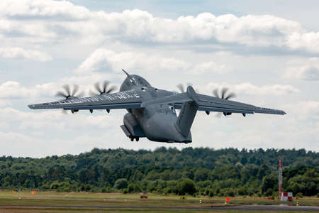 Farnborough, UK - July 17, 2014:  Airbus Defence and Space A400M military cargo aircraft F-WWMS.のeditorial素材
