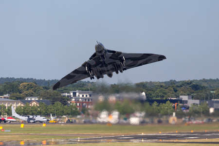 Farnborough, UK - July 19, 2014: Former Royal Air Force (RAF) Avro Vulcan B.2 bomber aircraft XH558 operated by the Vulcan to the Sky Trust.のeditorial素材