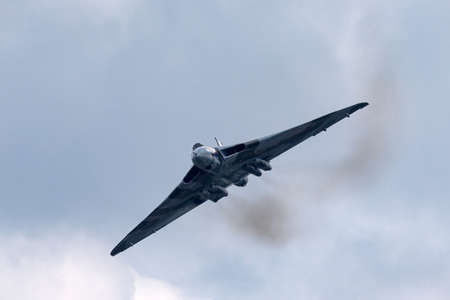 Farnborough, UK - July 21, 2014: Former Royal Air Force (RAF) Avro Vulcan B.2 bomber aircraft XH558 operated by the Vulcan to the Sky Trust.のeditorial素材