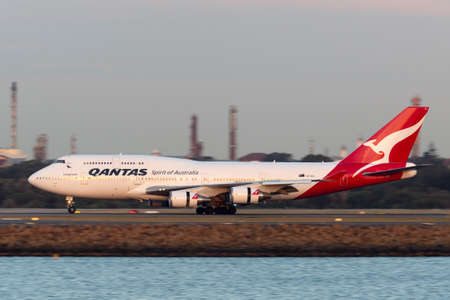 Sydney, Australia - October 10, 2013: Qantas Boeing 747 jumbo jet commercial airliner landing at...
