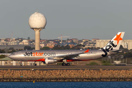 Sydney, Australia - October 9, 2013: Jetstar Airways Airbus A330 airliner aircraft on the tarmac at Sydney Airport after landing.のeditorial素材