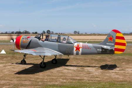 Lethbridge, Australia - November 23, 2014: Yakovlev Yak-52W Russian Military trainer aircraft VH-YKW.のeditorial素材