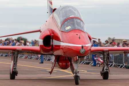 RAF Fairford, Gloucestershire, UK - July 12, 2014: Royal Air Force (RAF) Red Arrows formation...