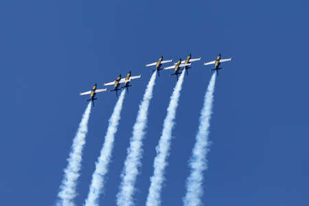 Payerne, Switzerland - September 5, 2014: Breitling Jet Team Aero L-39C Albatross jet trainer aircraft flying in formation.のeditorial素材