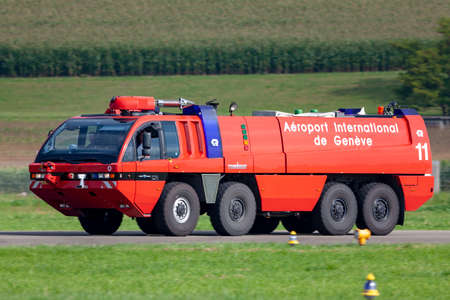 Payerne, Switzerland - August 29, 2014: Rosenbauer airport fire engine from Geneva Airport.のeditorial素材