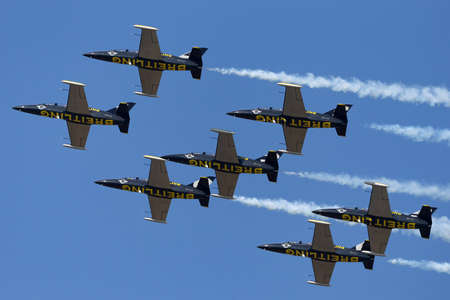 Payerne, Switzerland - September 5, 2014: Breitling Jet Team Aero L-39C Albatross jet trainer aircraft flying in formation.のeditorial素材
