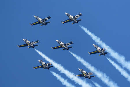 Payerne, Switzerland - September 5, 2014: Breitling Jet Team Aero L-39C Albatross jet trainer aircraft flying in formation.のeditorial素材